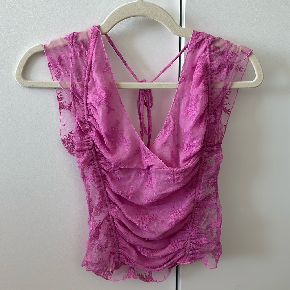 Pink free people top with flower design